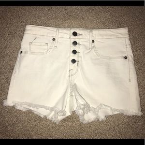 White high waisted shorts.
